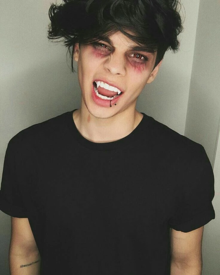 Vampire fangs and dark eyes