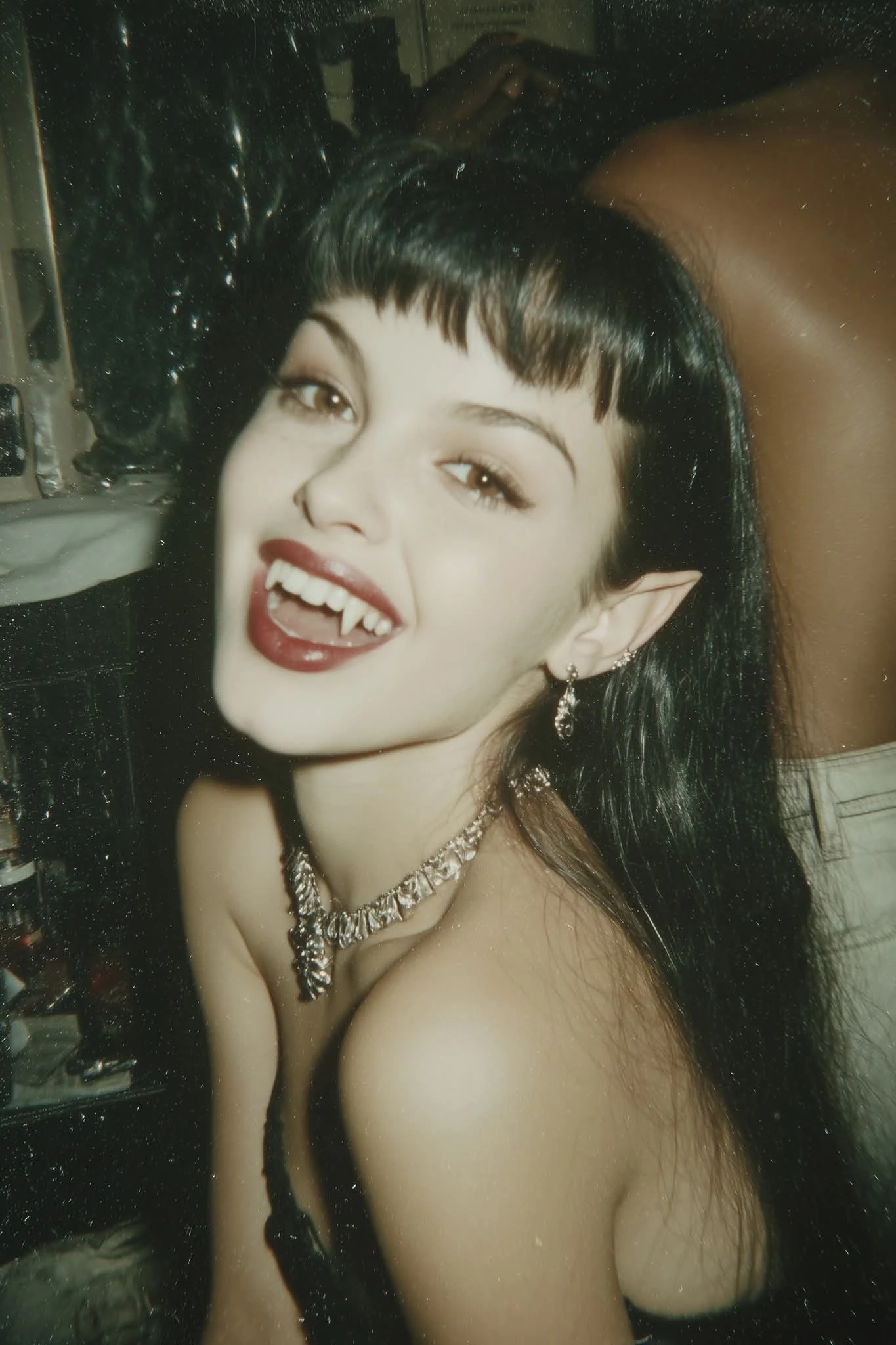 Vampire fangs and bobbed hair
