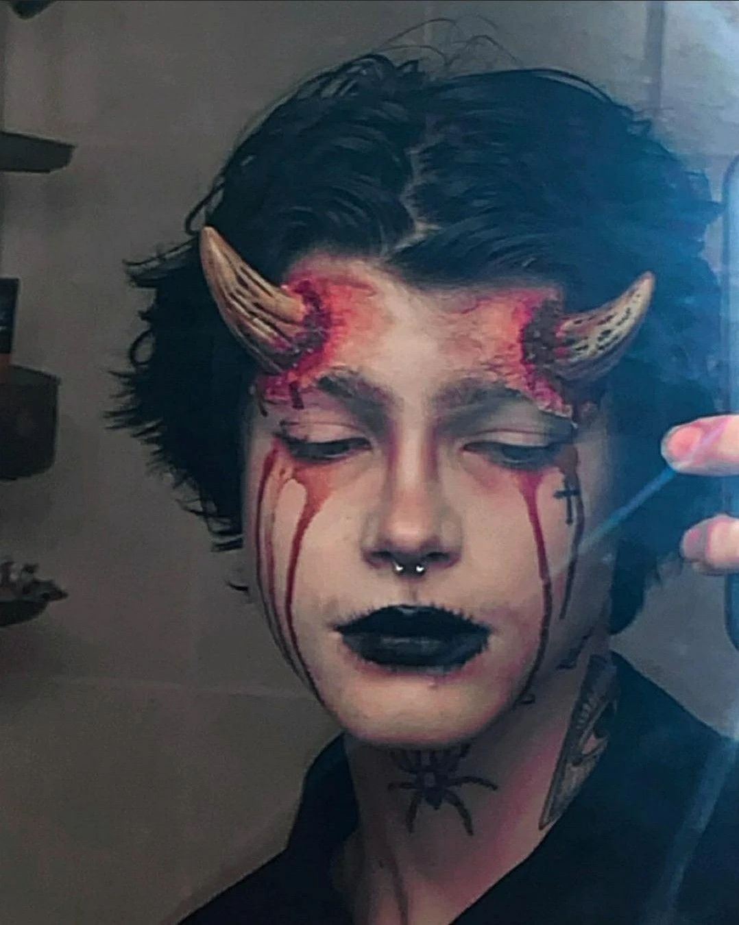 Demon horns and dark lips