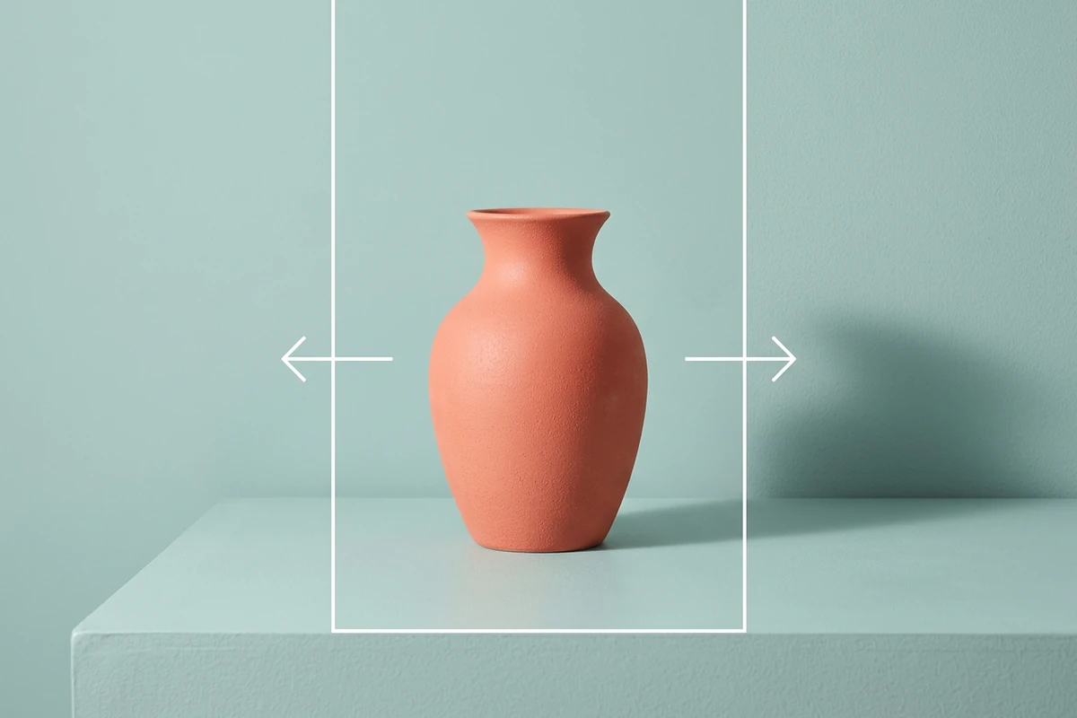 Coral vase centered inside a wider teal studio canvas with arrows marking the added space.